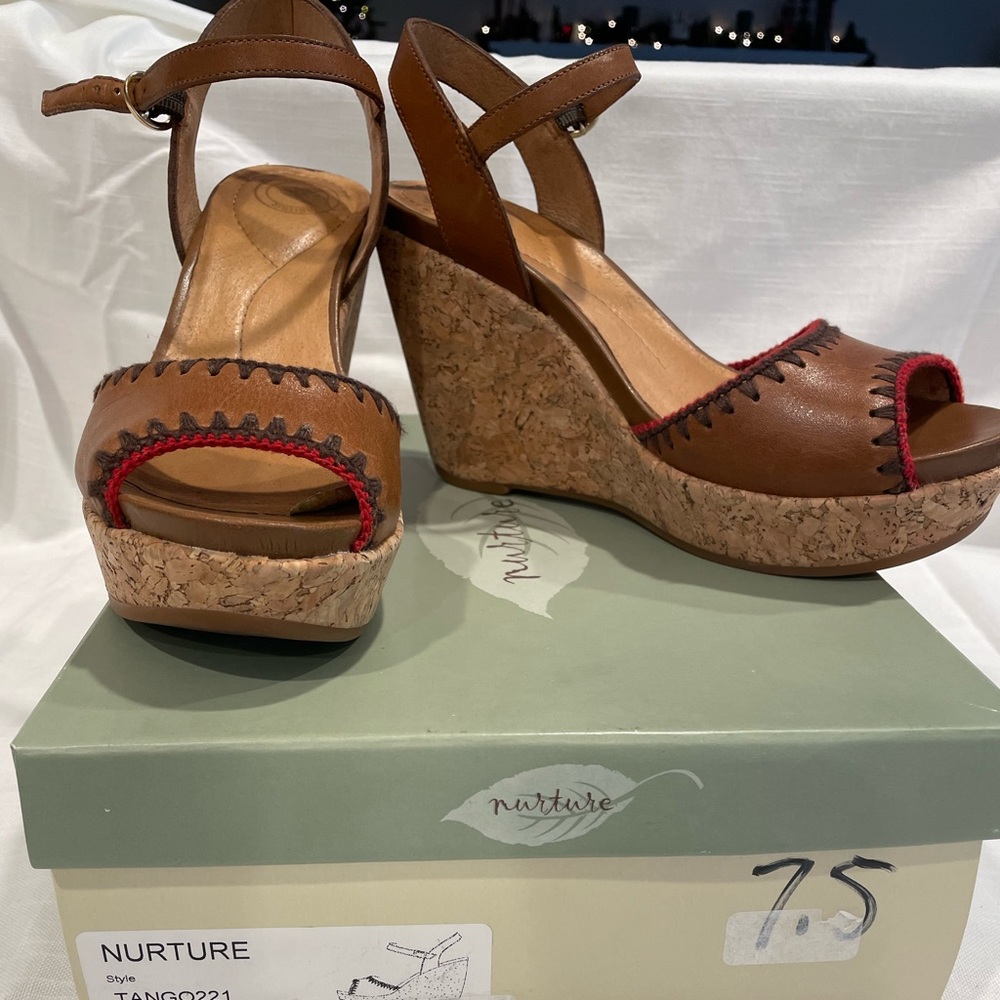 Nurture brown cork wedges with red stitching.  Size 7.5